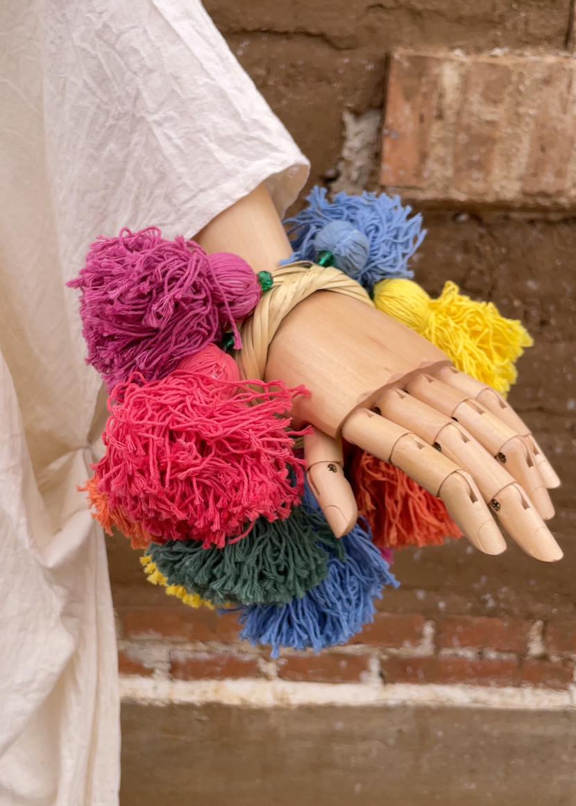 Pulsera pompones