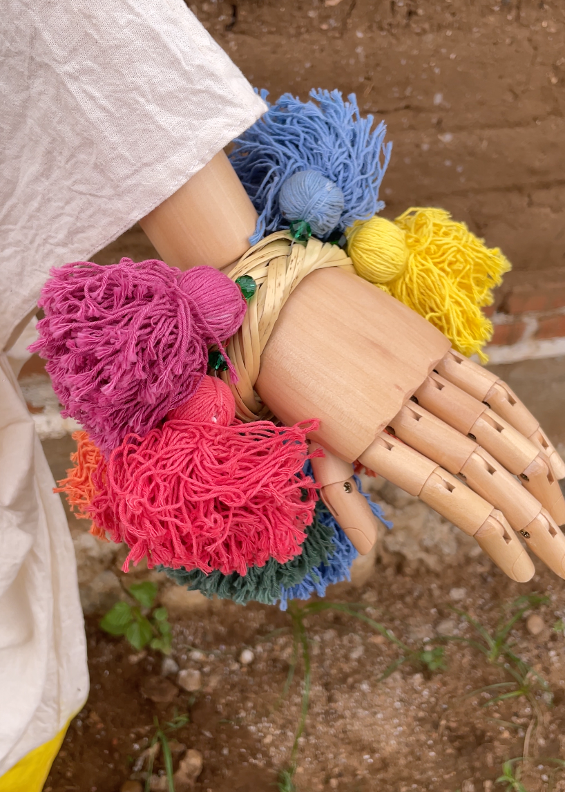 Pulsera pompones