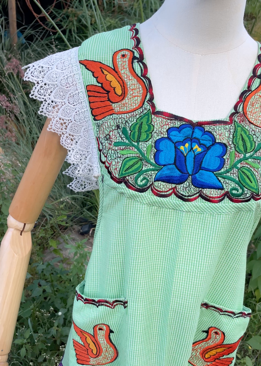 Mandil flor y reencuentro