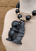 Collar barro negro angelito