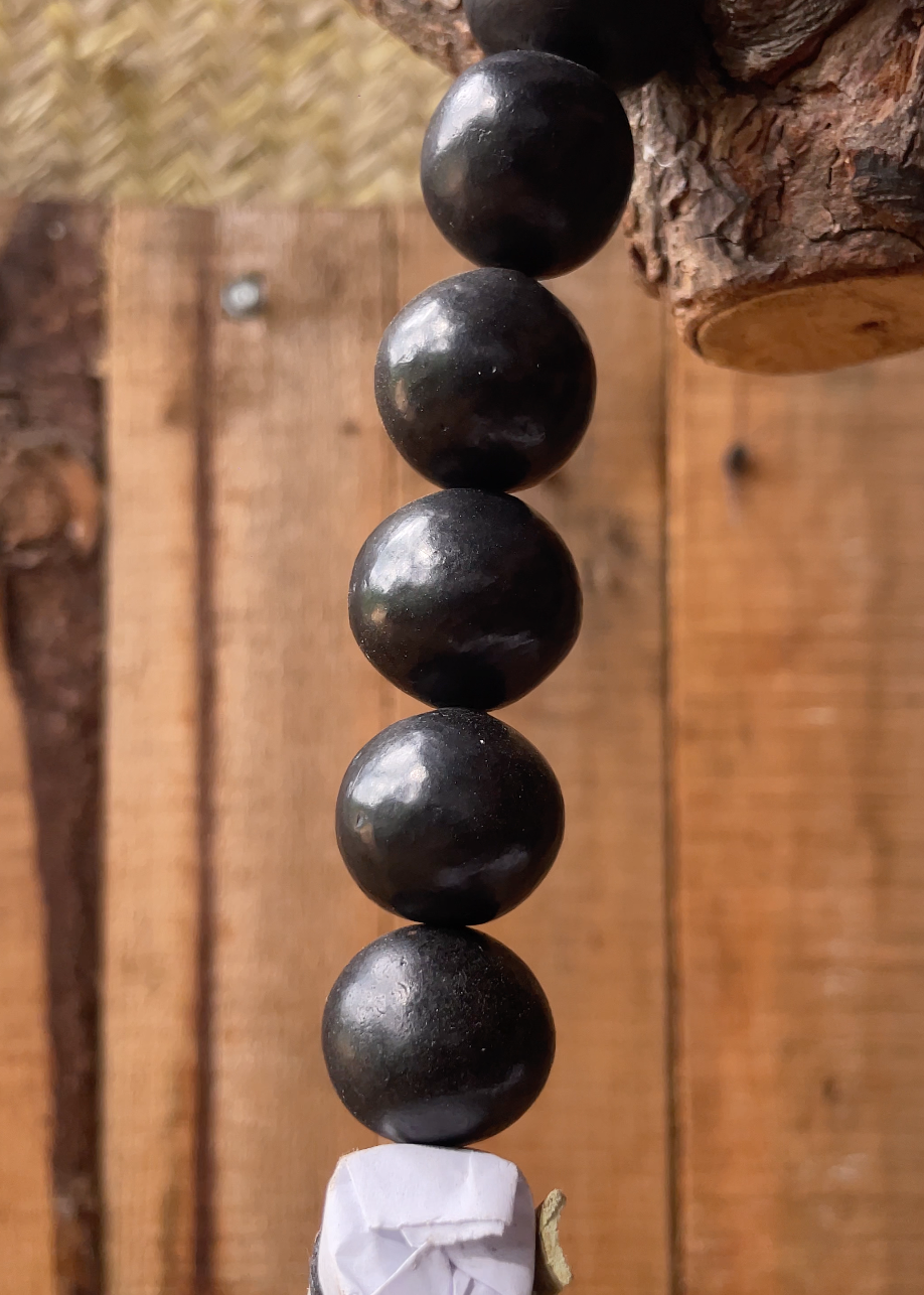 Collar barro negro y carrizo cohete